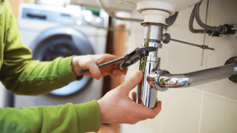 Plumbing contractor at work