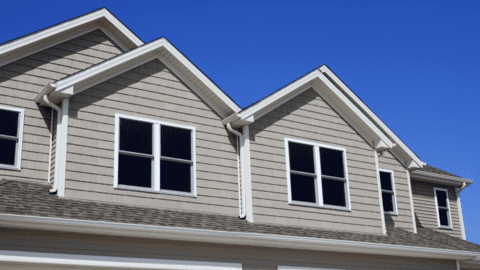 Siding & Gutters contractor at work
