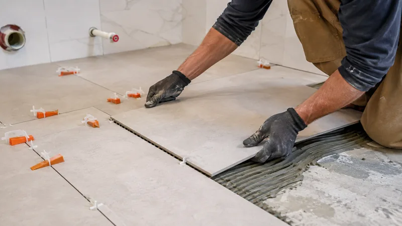 Tile contractor at work